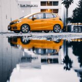 photo of yellow car during daytime