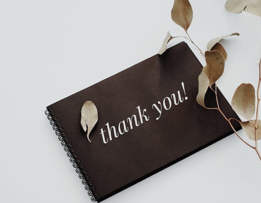 thank you printed on a notebook