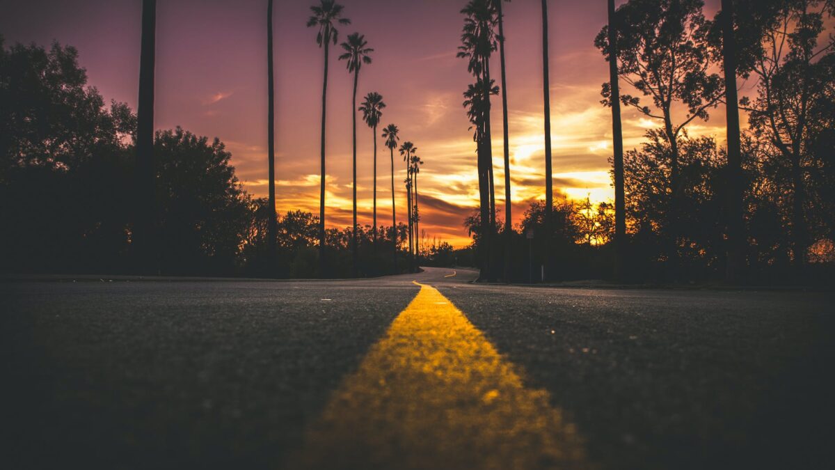 road in city during sunset