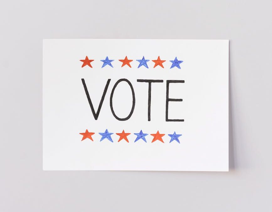 vote poster on white surface