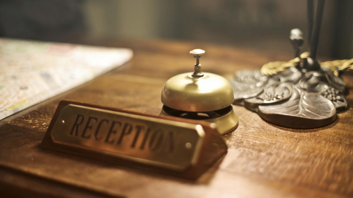 reception desk with antique hotel bell
