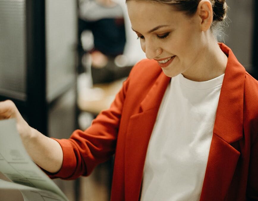 woman wearing red blazer