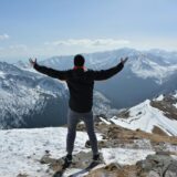 man standing on mountain