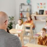 a teacher teaching students