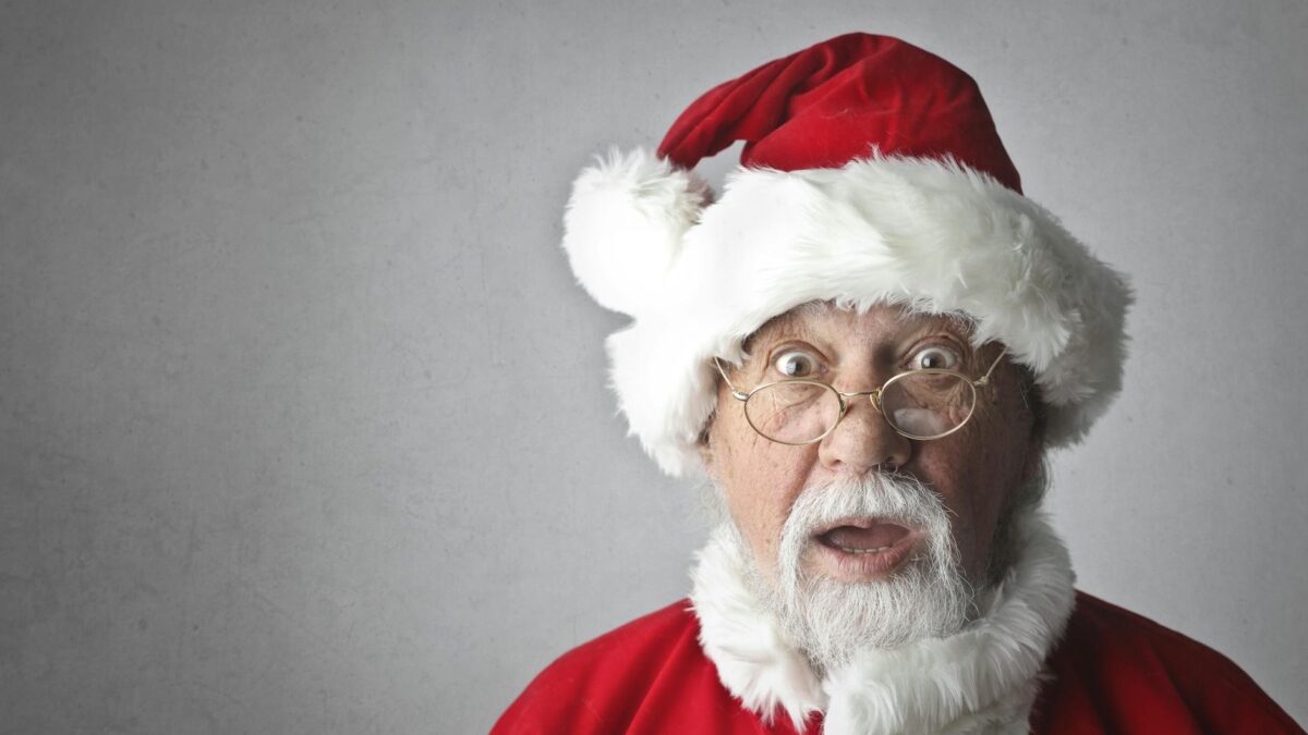 man in santa claus costume