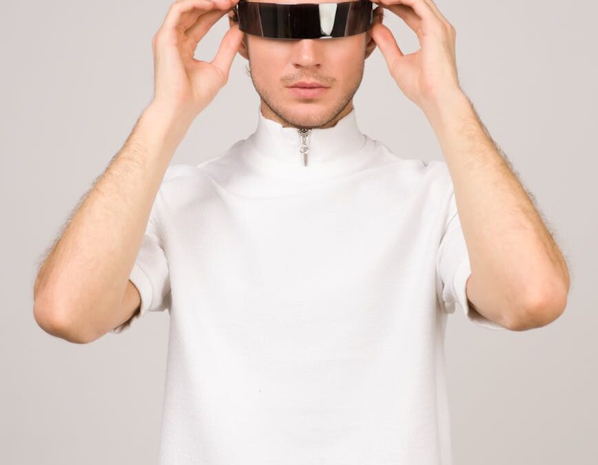 man wearing white turtle neck t shirt