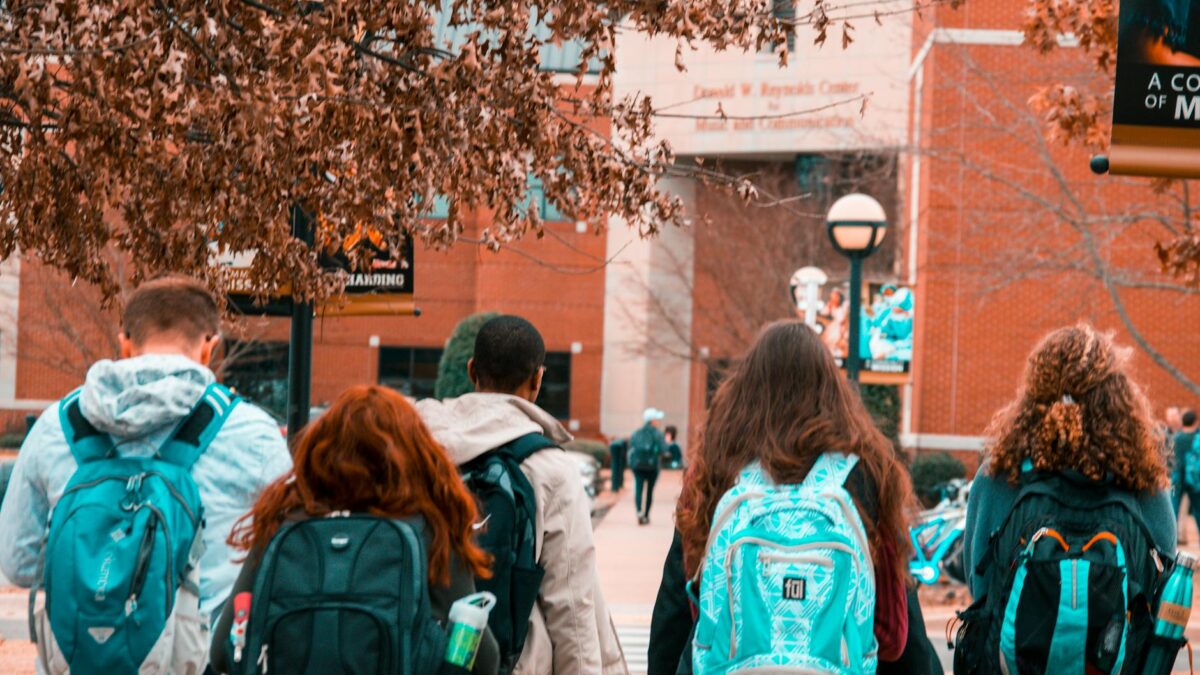 people wearing backpacks