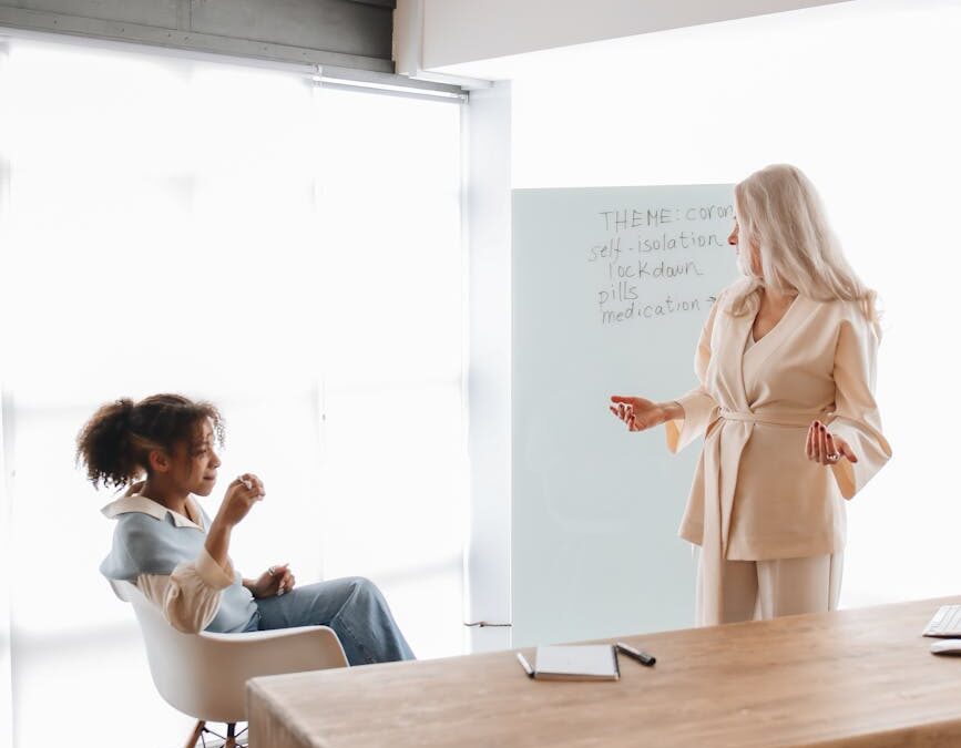 teacher discussing her lesson with her student