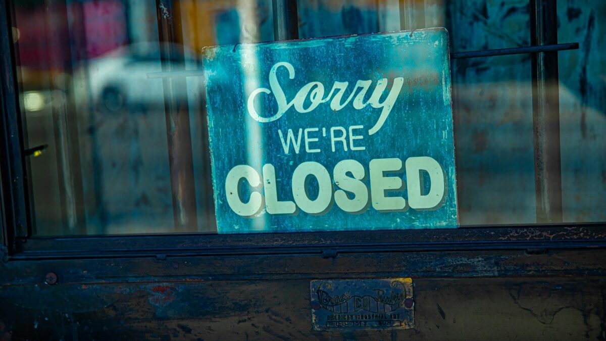 a close signage on a glass door