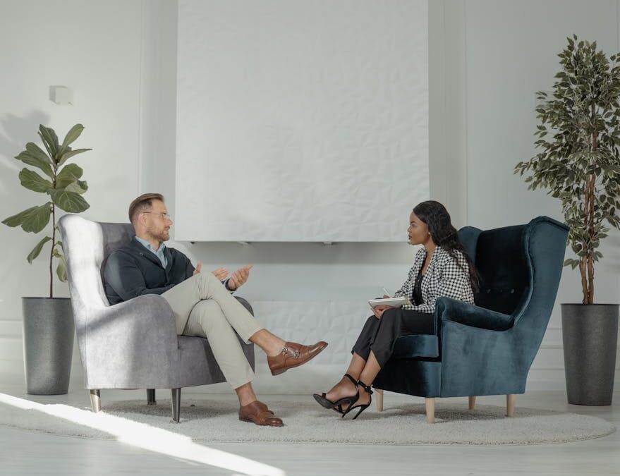 a woman interviewing a man