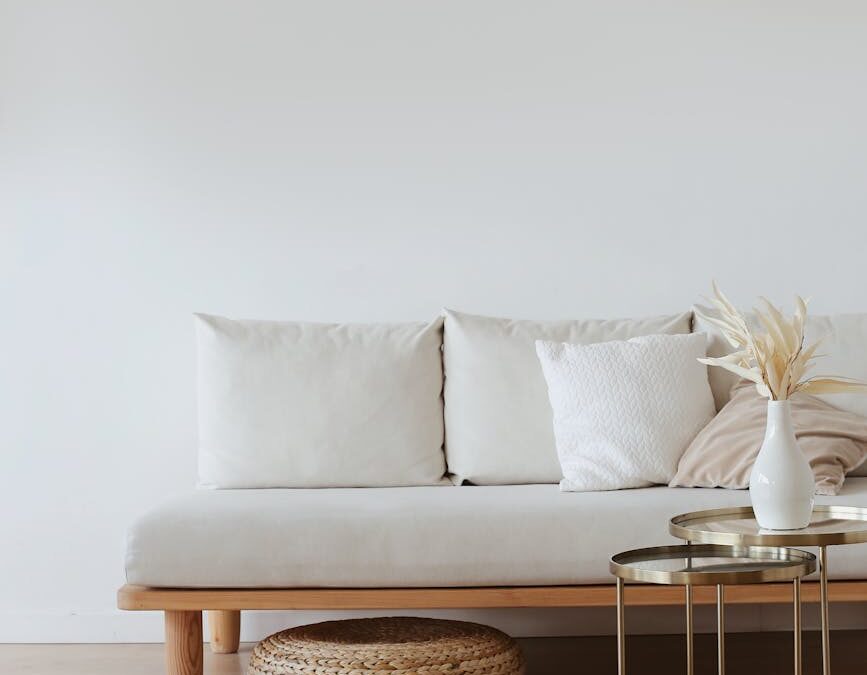 white couch on wooden floor