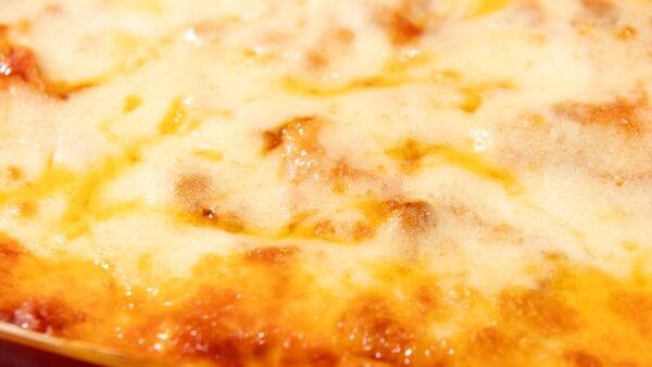 close up of baked cheesy lasagna